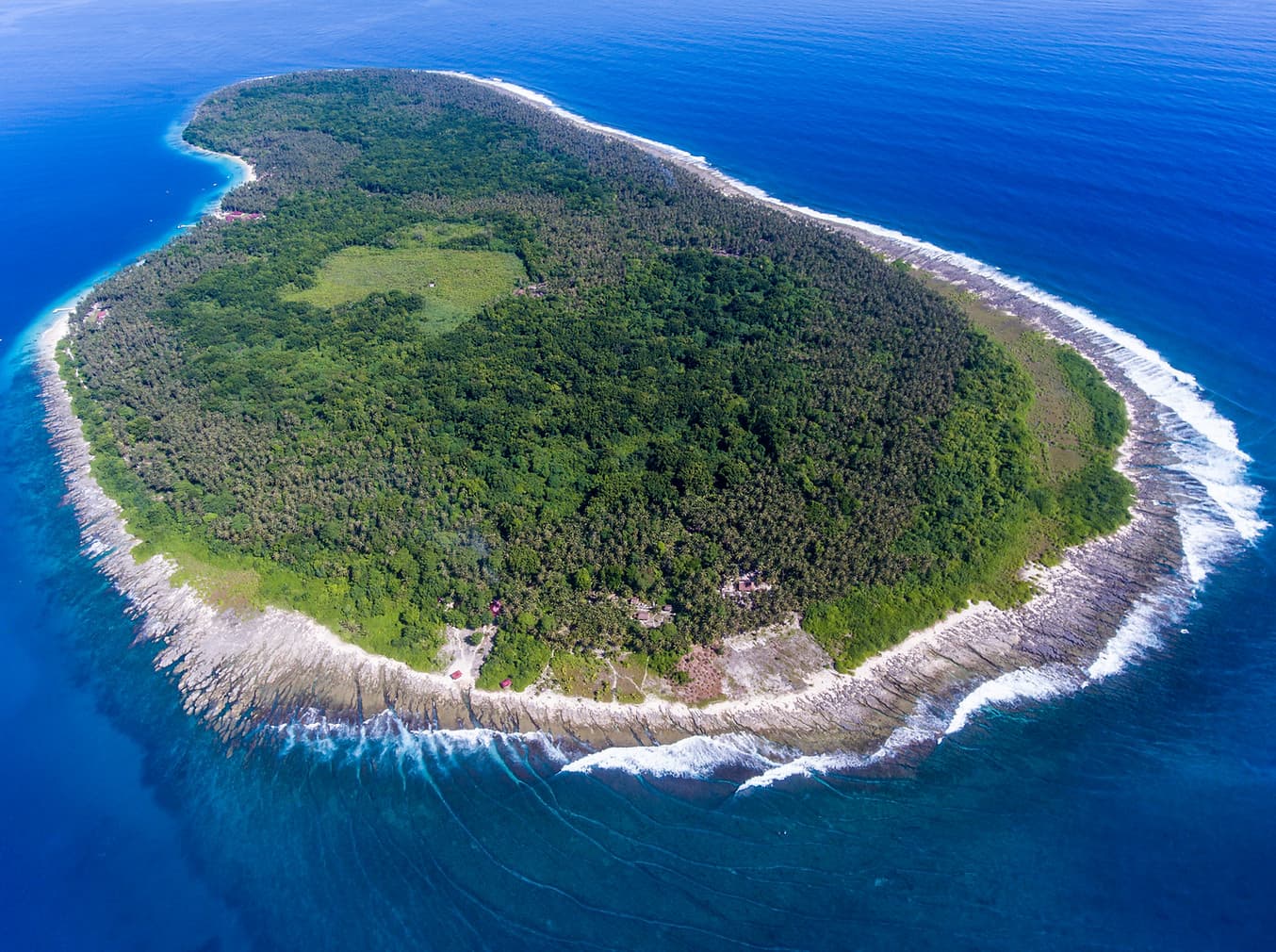 Aerial view of Asu Island and reef